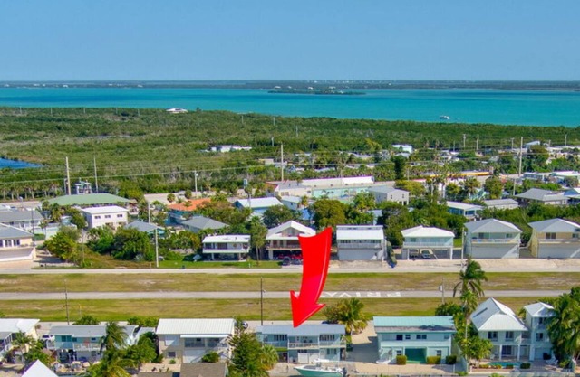 Beautiful 3 Bedroom Canal Front Home Located On A Private Airstrip