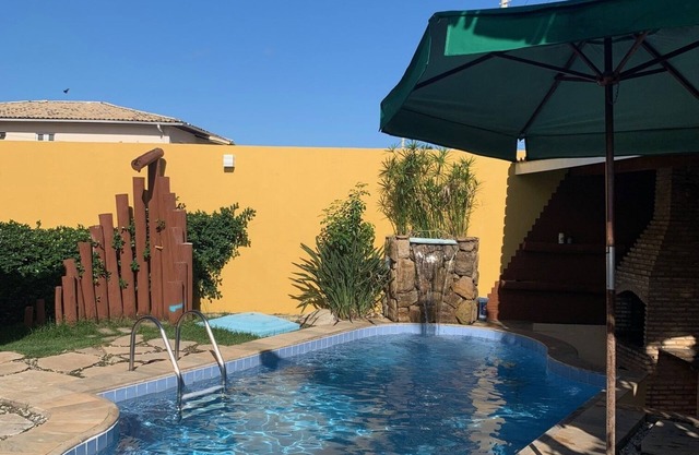 Hermosa casa de playa con piscina y bar, una barbacoa 250m mar