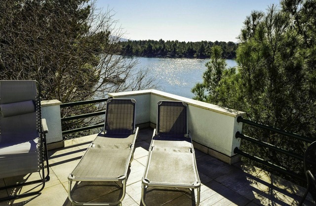 Preciosa casa de vacaciones privada con WIFI, A/C, TV, terraza, mascotas permitida y aparcamiento