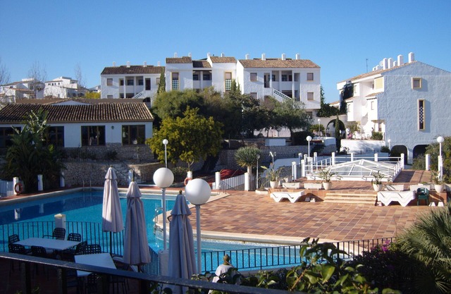 Hermoso apartamento de dos camas con piscina compartida con magníficas vistas