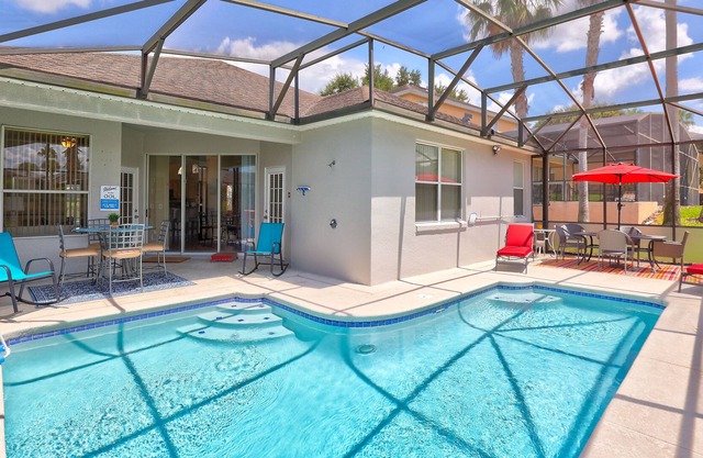 Beautiful villa 7.5 miles from Disney's Animal Kingdom. Two master suites.