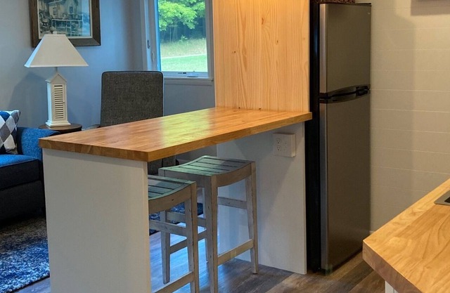 Beautiful wooded area right outside your door and a 5 minute walk to Hamlin Lake