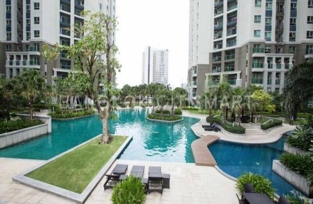 Belle Condo (693) A pie de la Plaza Central