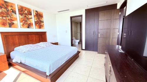 Bellini 3, Puerto Santa Ana, Suite Ejecutiva con vista, lavadora, secadora, wiffi