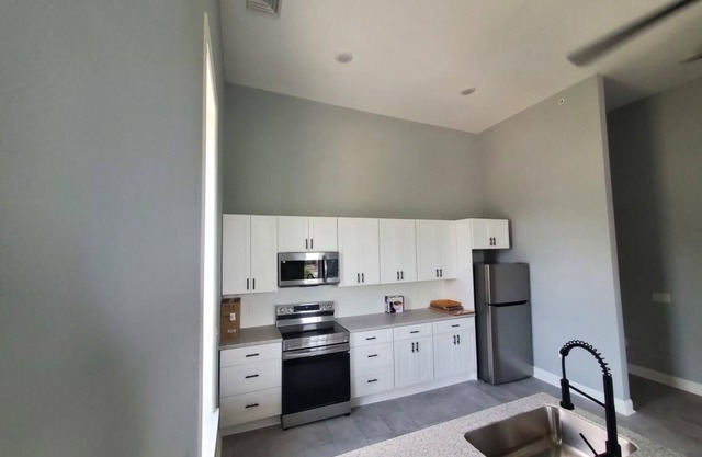 BRAND NEW.......EVERYTHING IS IN WALKING DISTANCE