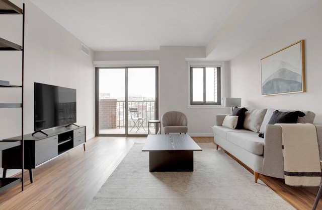 Bright Clarendon 1BR w/ W/D & Gym, across street from WF, by Blueground