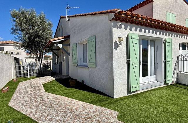 Apartamento en planta baja con jardín, cerca de la playa