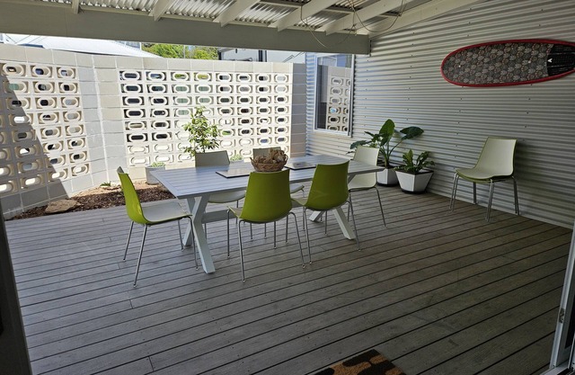 Bright happy home suitable for two couples or upgrade to five guests.