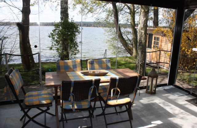 Bungalow directamente en el lago con jardín de invierno, muy privado - Ferienhof Löschebrand