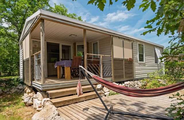 Camping Les 3 Cantons **** - Casa móvil Midi Pirineos 4 habitaciones 6 personas