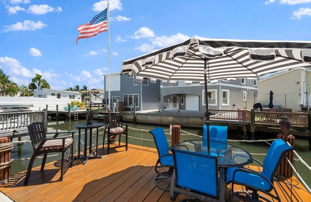 Canal Front! Stunning, beautifully updated 3-bedroom, 2.5-bath coastal-style beach home