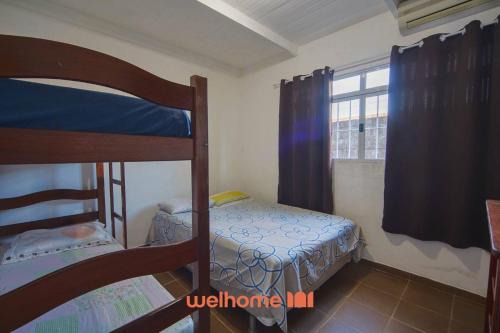 Casa em Bertioga com lazer e praia próxima