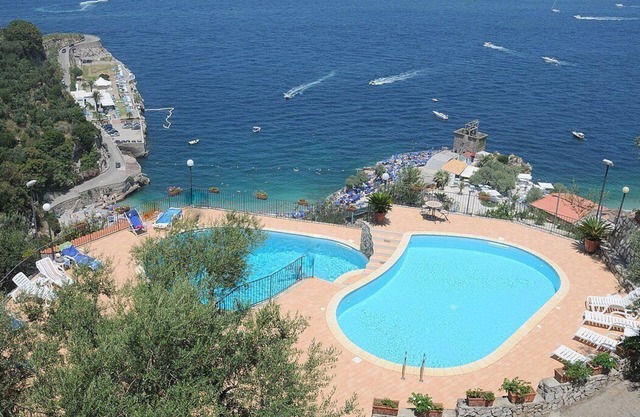 Casa Milli A: Un agradable apartamento ubicado en un promontorio frente al mar.
