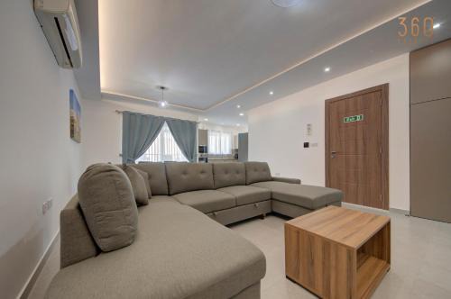 Central Comfort, Stylish 2BR Apt with Balconies by 360 Estates