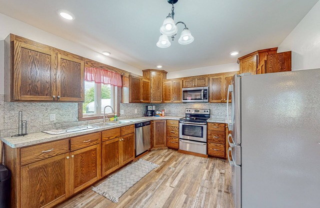 Charming 2-story dog-friendly farmhouse with game room, firepit, deck, grill