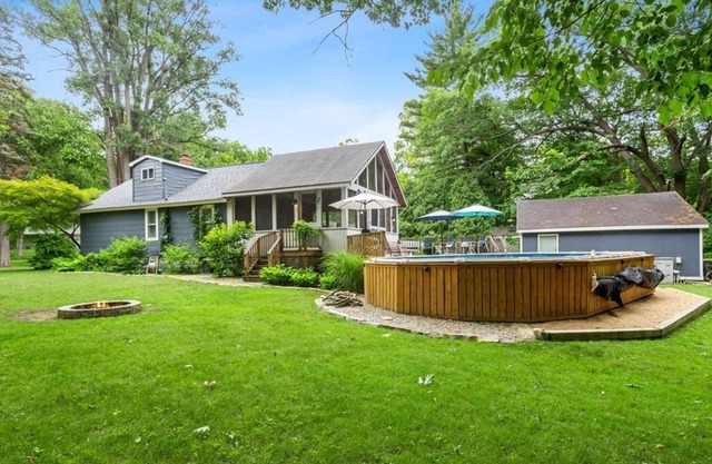 Charming cottage with fast WiFi, fire pit, above-ground pool, & huge sunroom