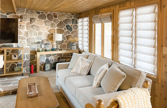 Charming lakefront home with dock, fireplace, streaming, lake views, W/D, & AC