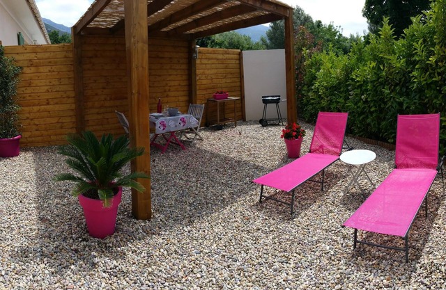 Encantadora casita con aire acondicionado y espacio exterior en Patrimonio (wifi)