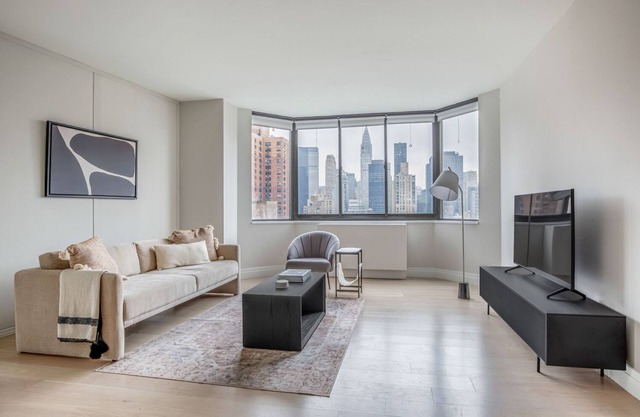 Clean Kips Bay 2BR w/ Gym & Doorman, nr Comedy & Theater, by Blueground