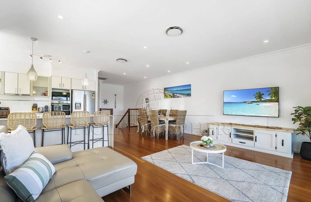 Comfort meets eloquent design in this impressive four-bedroom duplex!
