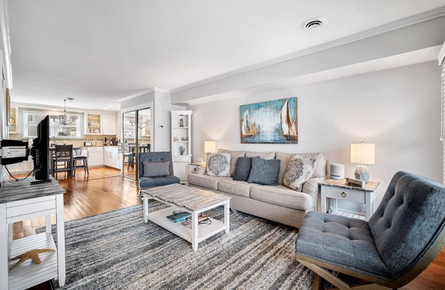 Condo across from beautiful beach with Pool! Two Floors!