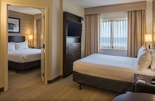 Convenience & Comfort! w/ Airport Shuttle Service, Pet-friendly Property!