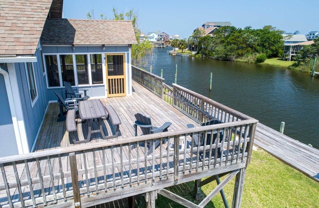 Cozy Canalfront Cottage w/ Hot Tub, Private Boat Dock, Smart TVs, Screened Porch