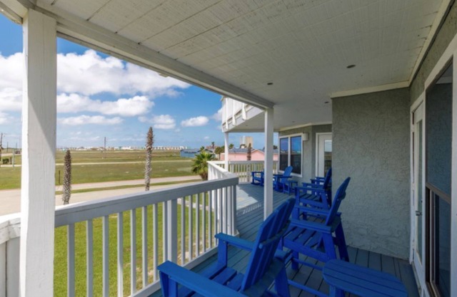 Cozy coastal condo steps from the beach.