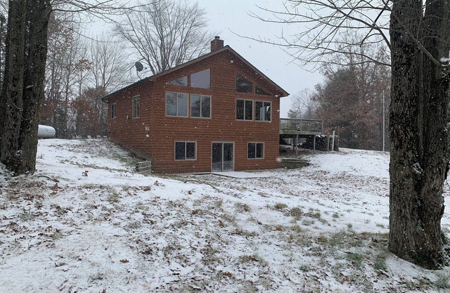 3-Bedroom Cabin Nestled in the Woods on a Pond! Sleeps 16-20 - ORV Trail access.
