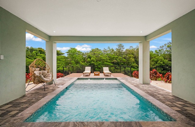 Sustainable Luxury Home with Pool & Tesla Charger Quick Drive from the Beach