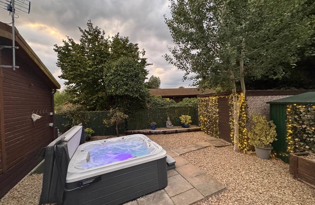 Elckys stunning HOT TUB lodge York with secure garden and kids play area
