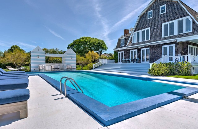 Elegant Watefront home with Oversized Gunite Heated Pool, Tennis, Living...