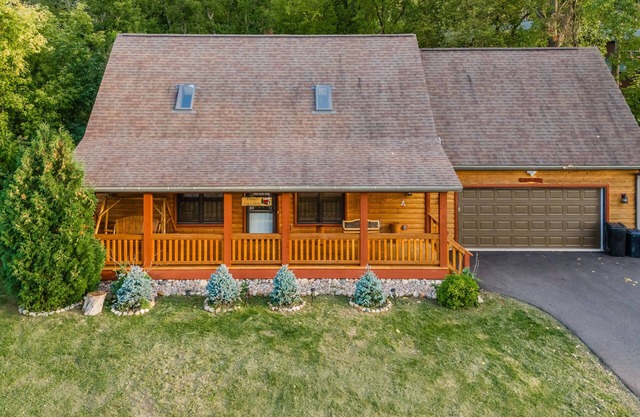 Elina’s Log Cabin, new on the market, steps from Devil’s Lake State Park.