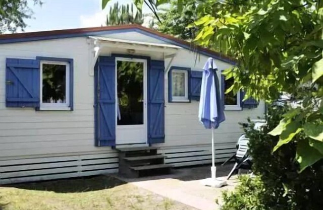 En Chon Les Pins - Camping-Caravaning *** - Chalet wood 30m2 2 bedrooms n° 29 SATURDAY / SATURDAY 4 to 5 people - 4 pers. included in the tariff