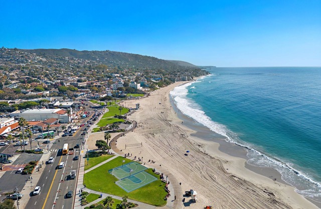 Enjoy heated pool and Stroll to Main Beach. #60