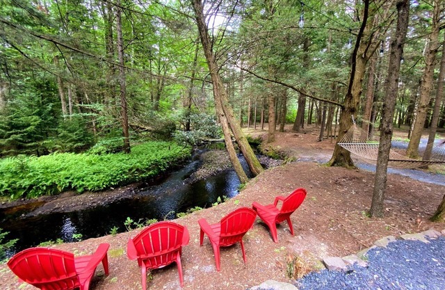 ENJOY POCONOS BY THE MONTH AT A TIME! COTTAGE AWAY FROM IT ALL ON STREAM!!