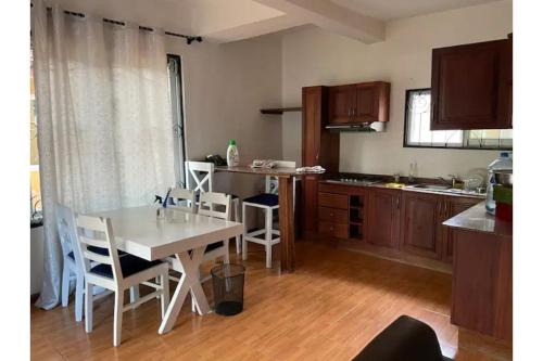 Entire 2 bedroom house with free wifi in Masaki