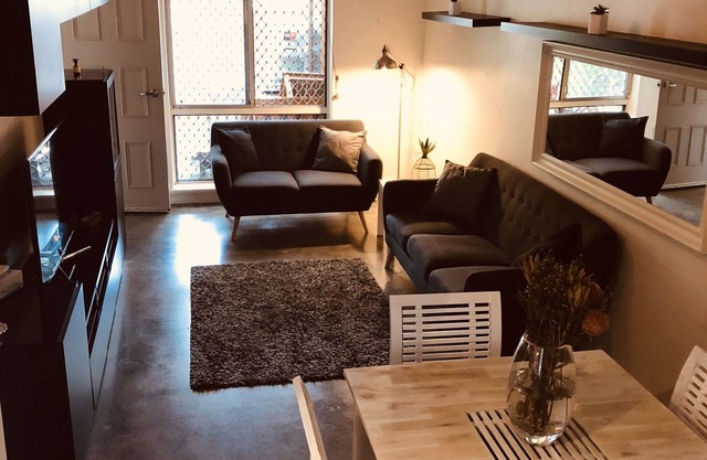 Entire modern ground floor unit with courtyard fronting park