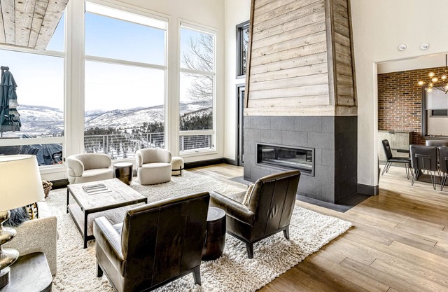 Exquisite mountainside home with fireplace, balcony, spectacular views, & W/D