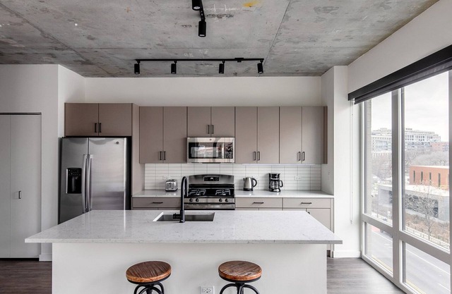 Exquisite River North 1BR w/ Terrace, Fire Pits & Grills, by Blueground