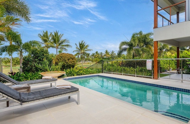 Fairway Breeze | A Tropical Oasis with Heated Pool