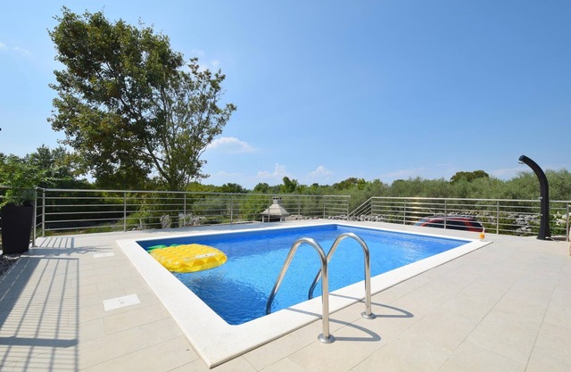 Casa familiar con piscina Barušići, Krk (K-23002)