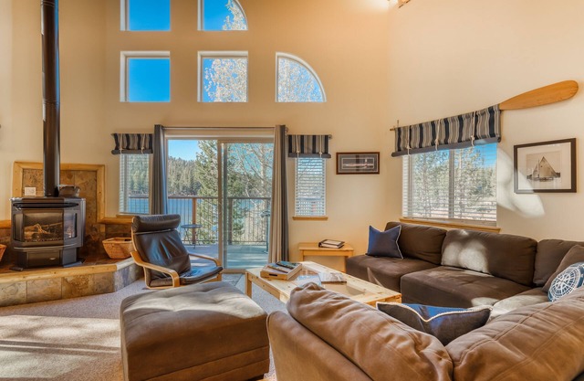 Family-friendly, lakefront getaway w/ a gas fireplace, furnished deck, & views