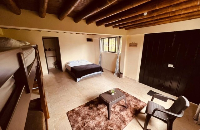 Family bedroom for 6 with private bathroom and living area