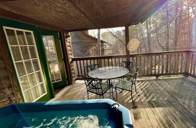 Forest View two bedroom, two bath Harbor North luxury loft cottage with private hot tub o Lake on Ouachita. by RedAwning