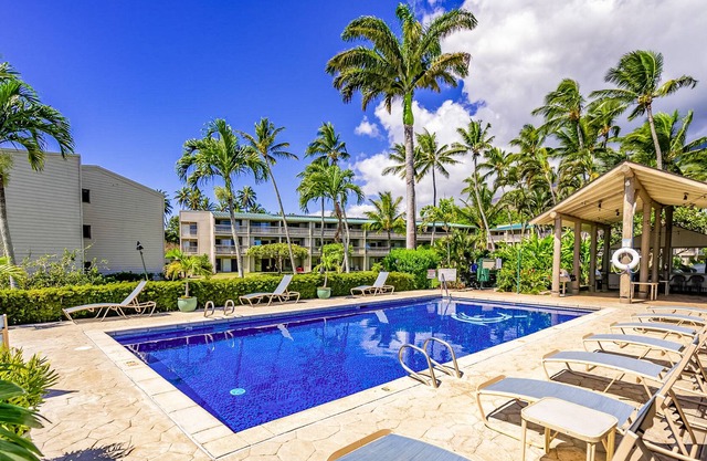 Ground-floor island getaway with ocean/mountain views, pool, & tennis courts