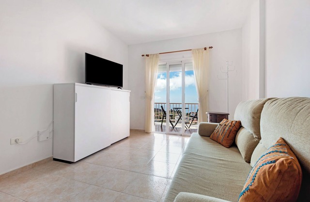 Casa de vacaciones 'Triana' con vistas al mar, terraza privada y Wi-Fi