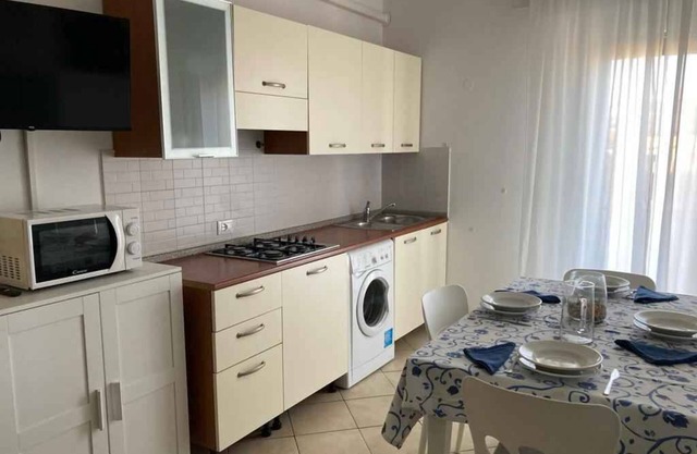 Holiday apartment with air conditioning, parking and close to the beach