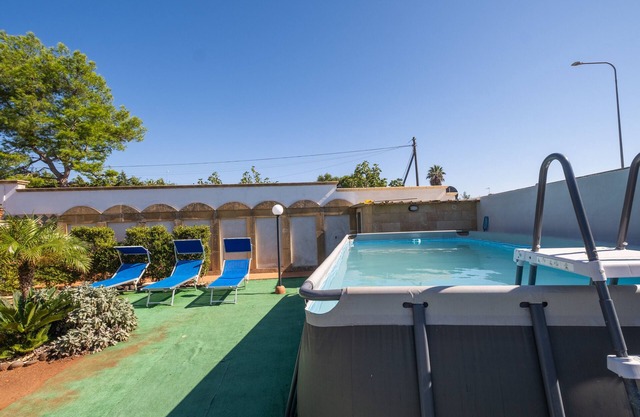 Casa de vacaciones 'Blue House In Villa Con Piscina' con piscina compartida