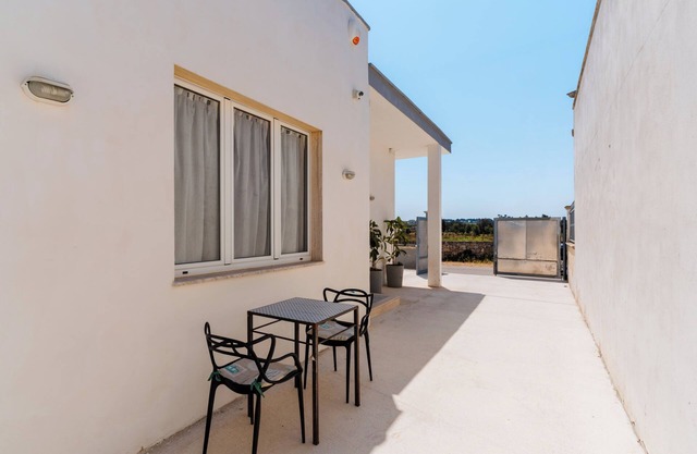 Casa de vacaciones 'Lu Mare' con vistas al mar, jardín compartido y aire acondicionado